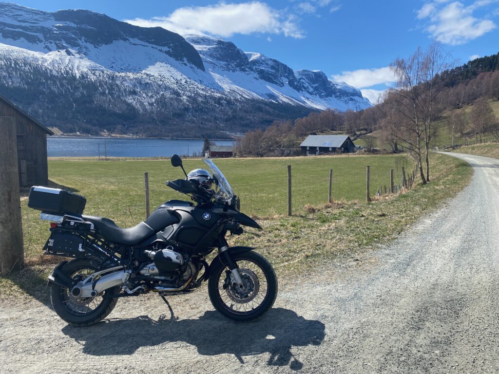 Image of a motorcycle in beautiful surroundings. Bucket list Norway.